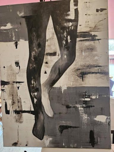 Large abstract painting of legs in black, white and gray